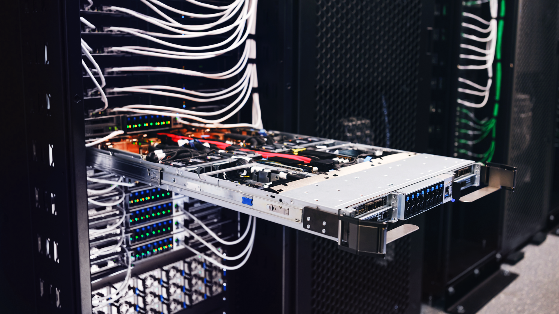 High-performance server with custom fiber optic interconnects and structured cabling in data center rack